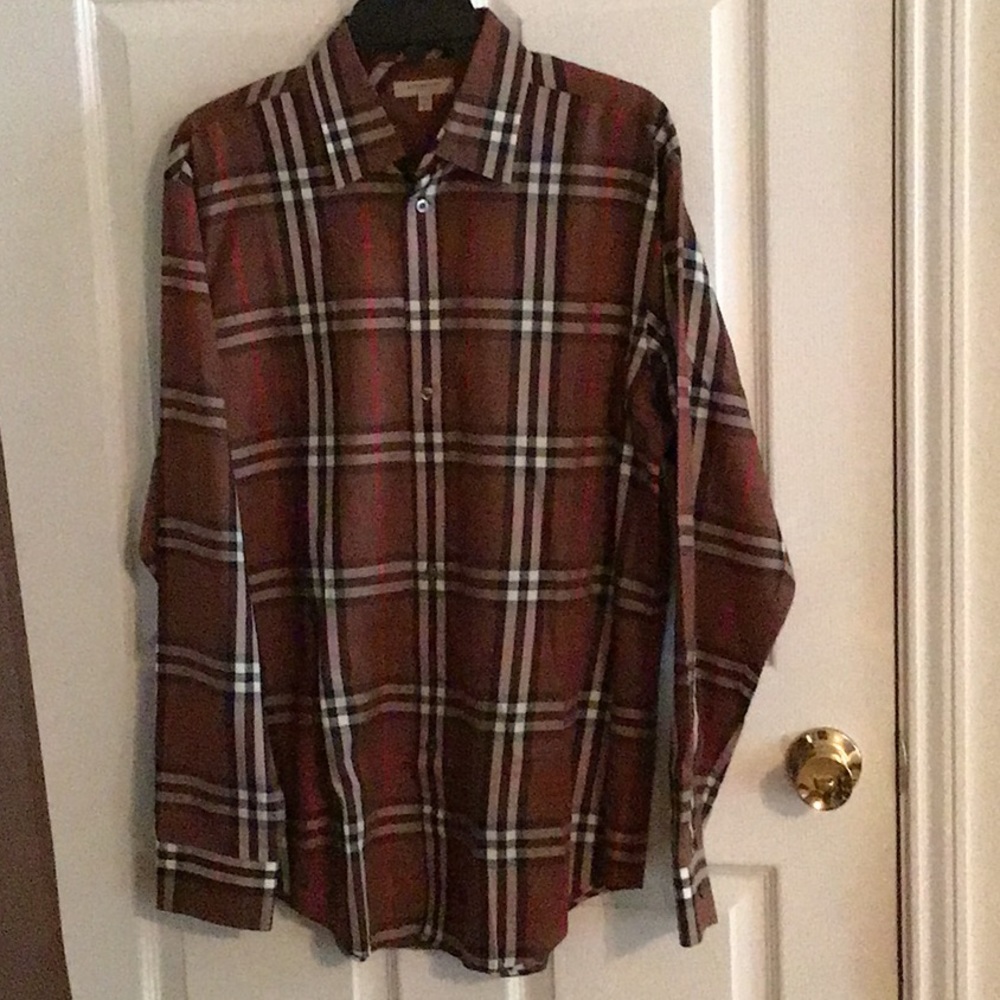 Burberry long sleeves polo shirt in large size.
